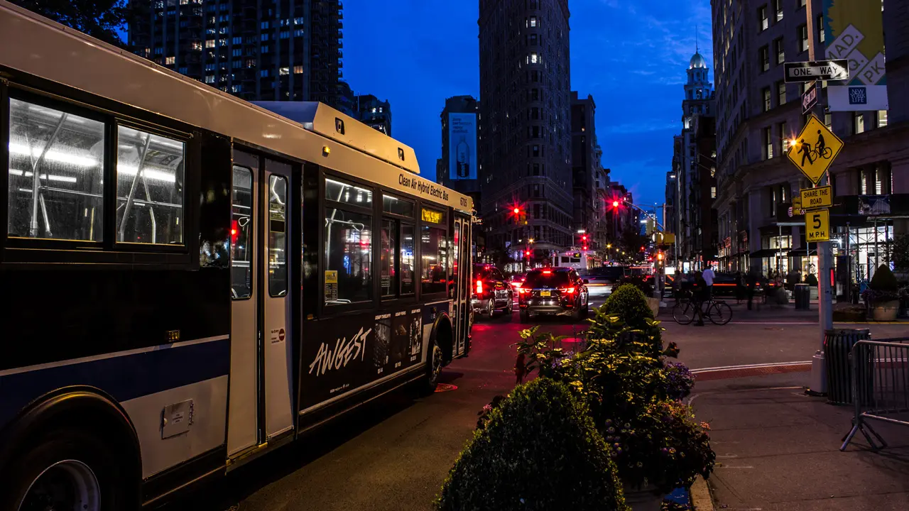 A MTA bus is stuck in traffic on Broadway, near 23rd Street.